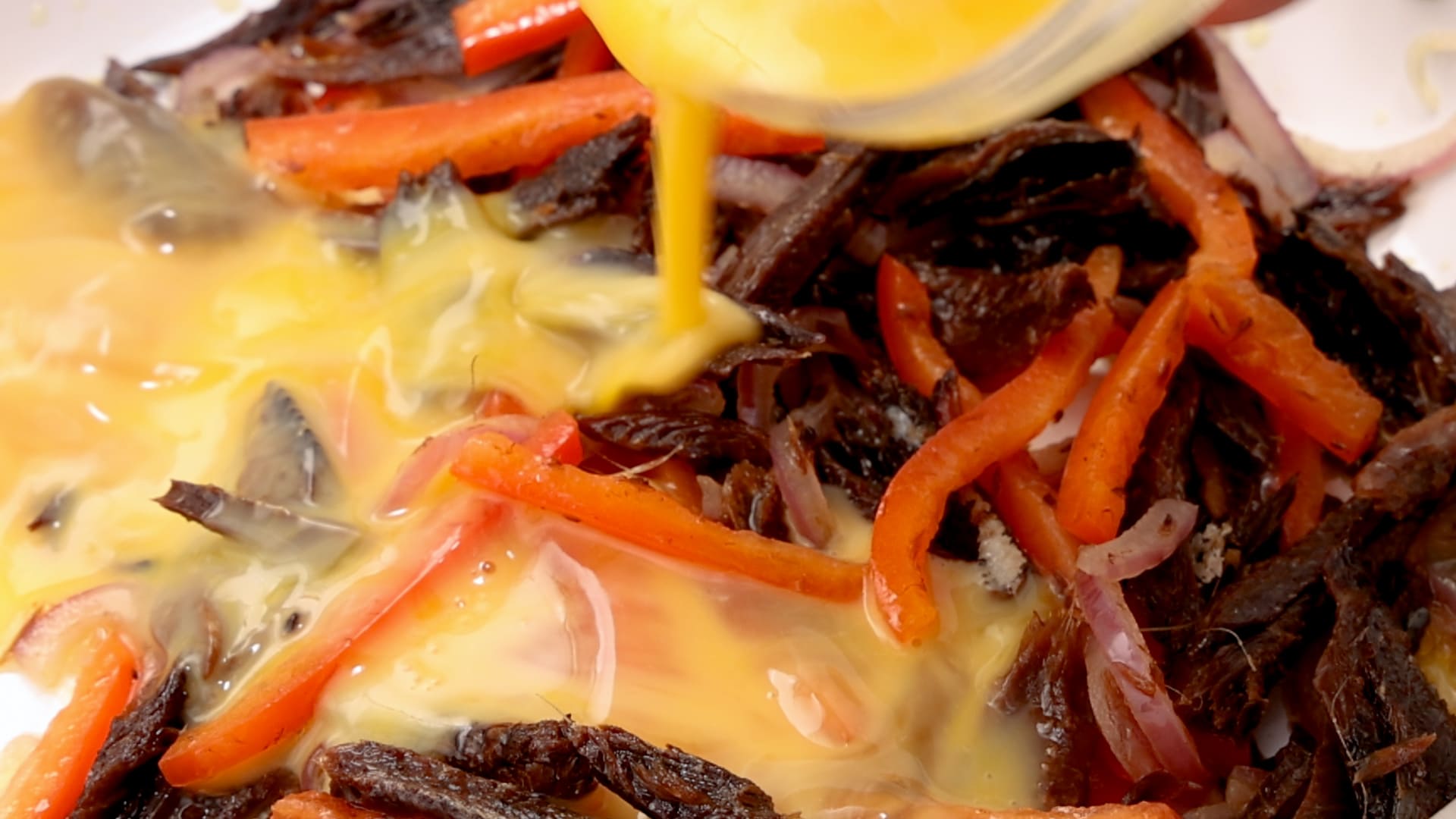 Cooking eggs and herring.