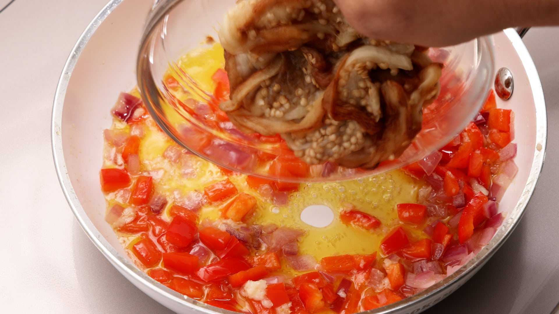 Sauteing the vegetables.