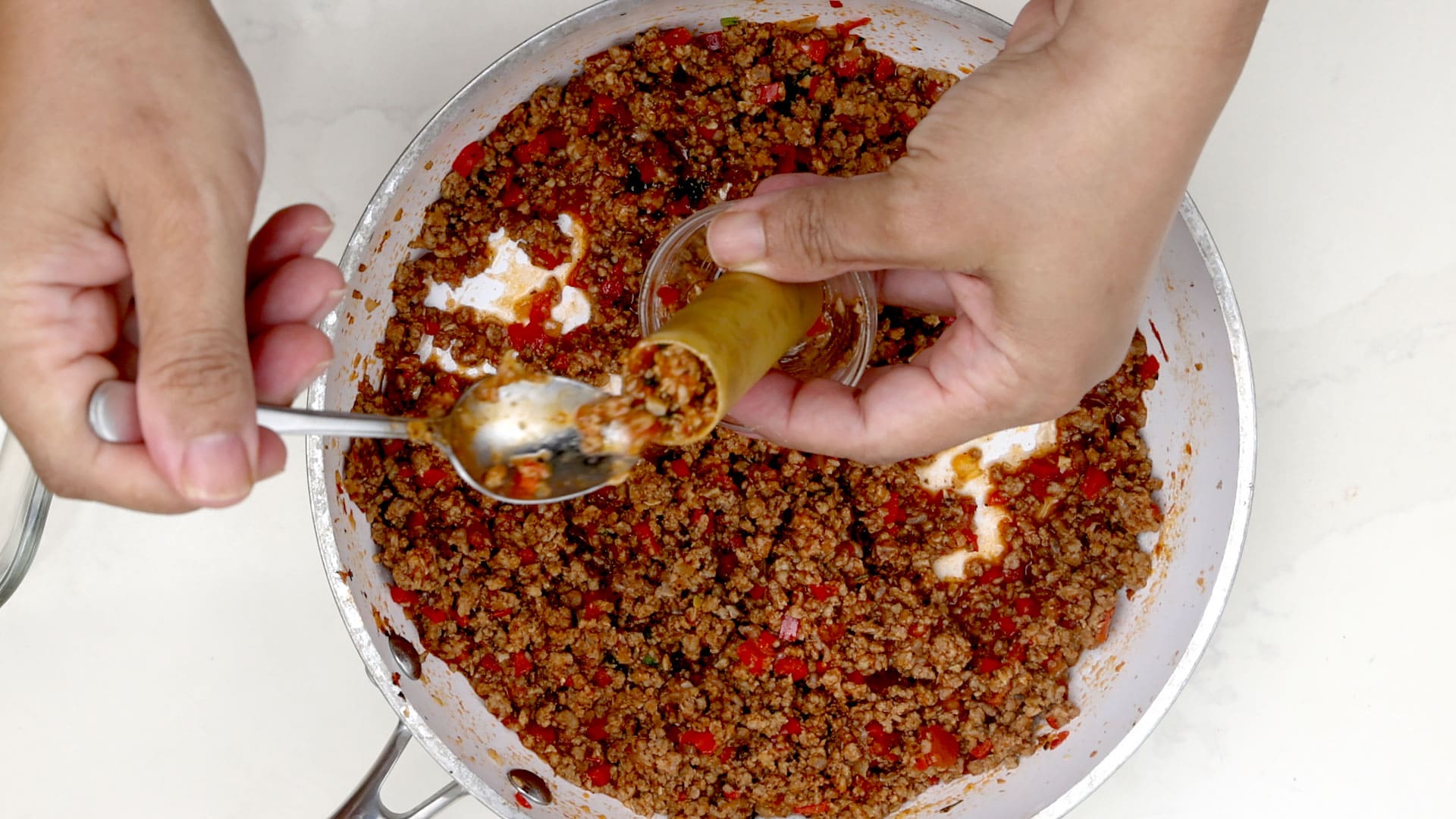 Filling the cannelloni.