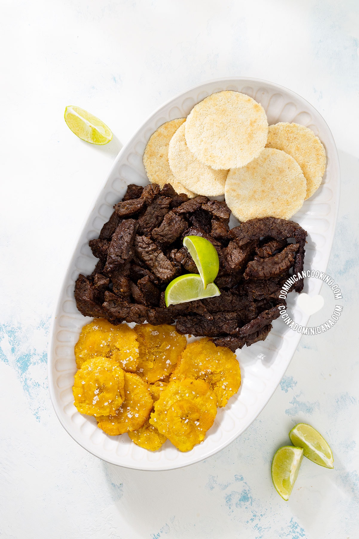Carnita frita, res frita or puerco frito (Dominican fried beef or fried pork).