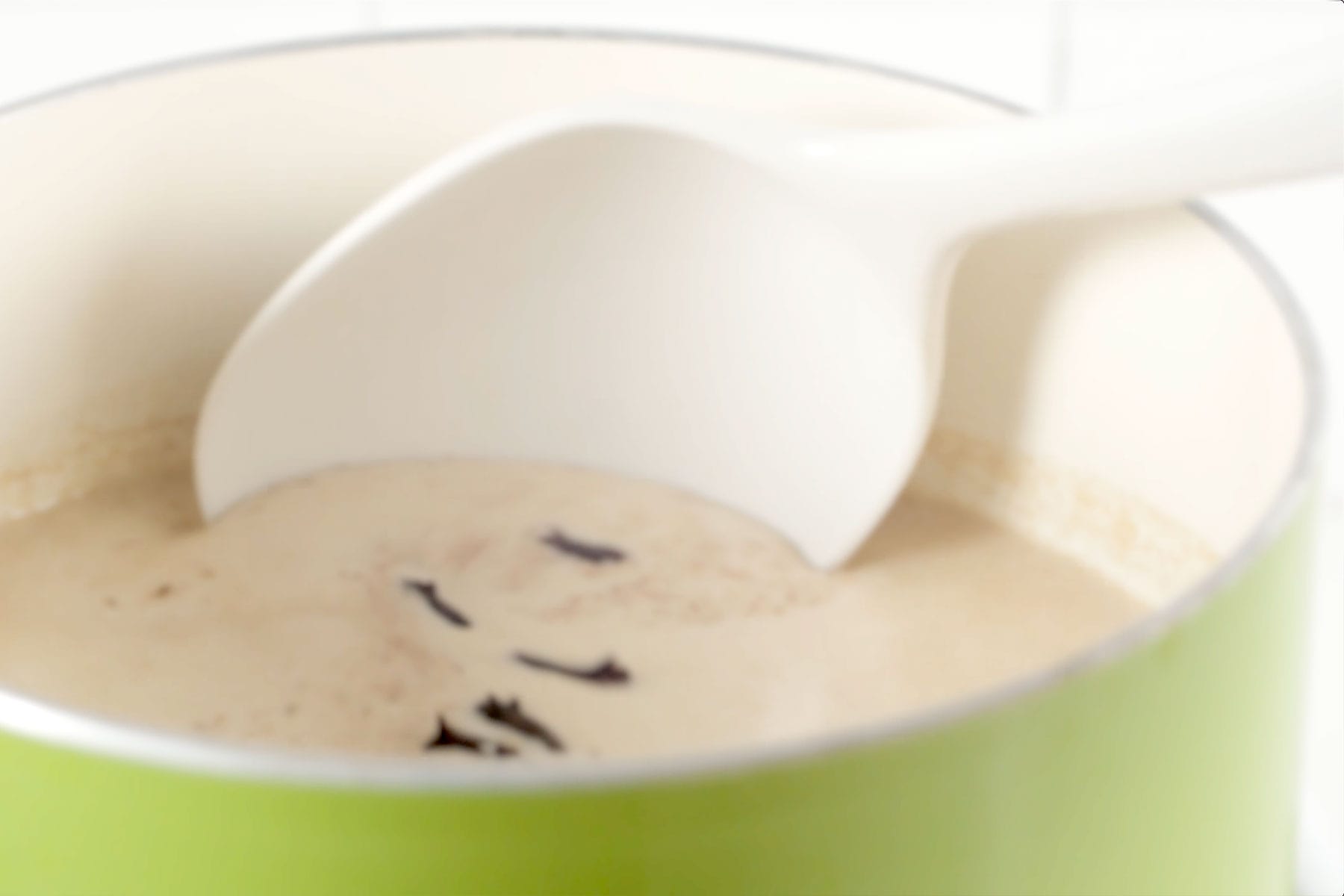 Combining ingredients hot cornmeal drink (chocolate de maíz).