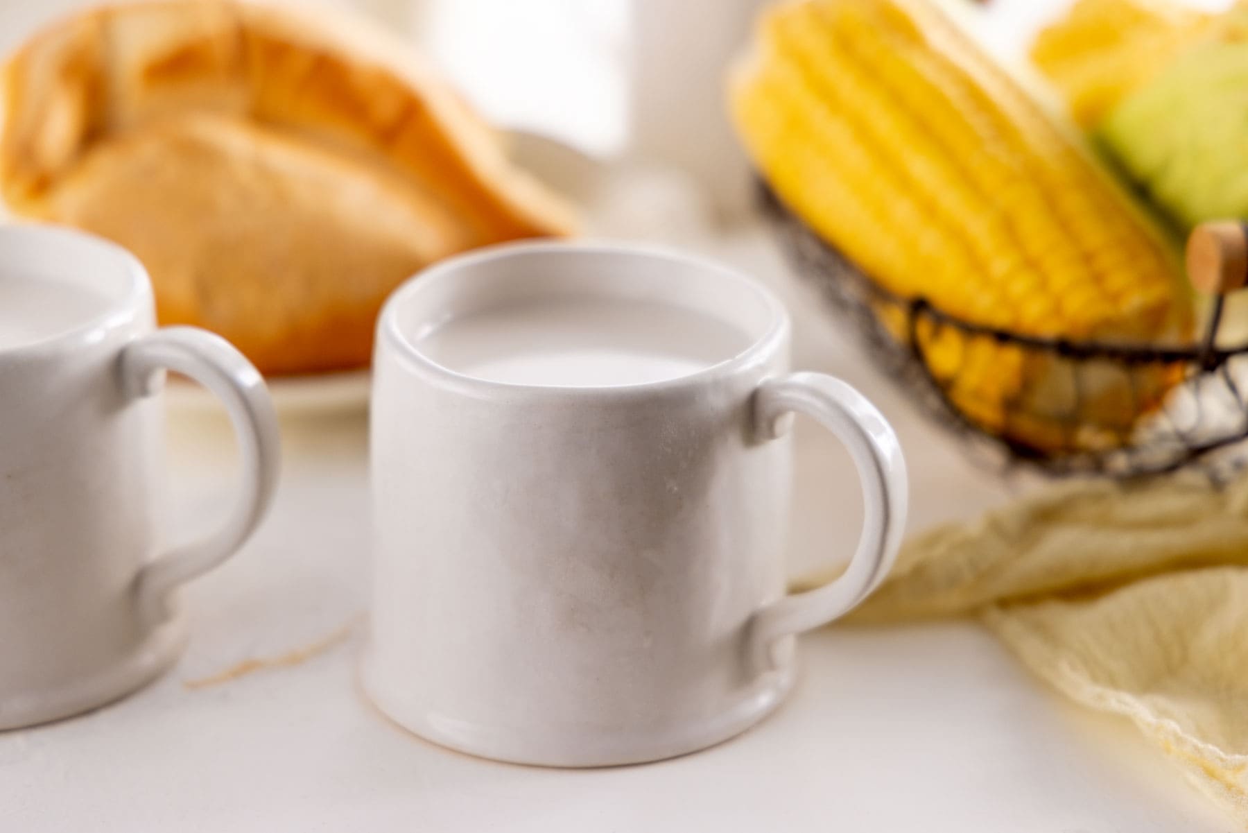 Hot cornmeal drink (chocolate de maíz) served.