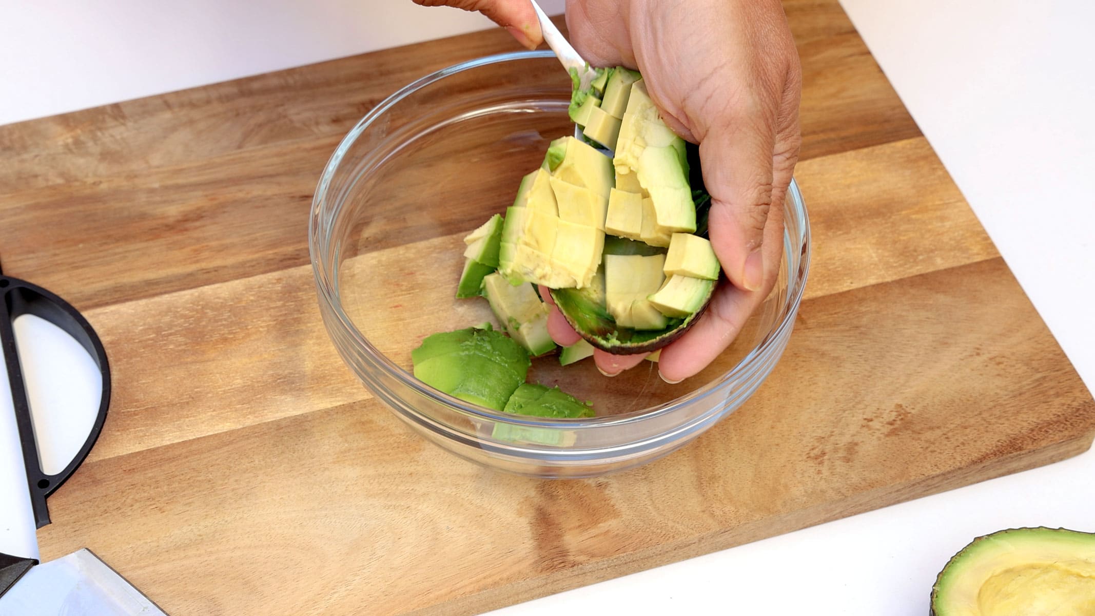 Cutting avocados.