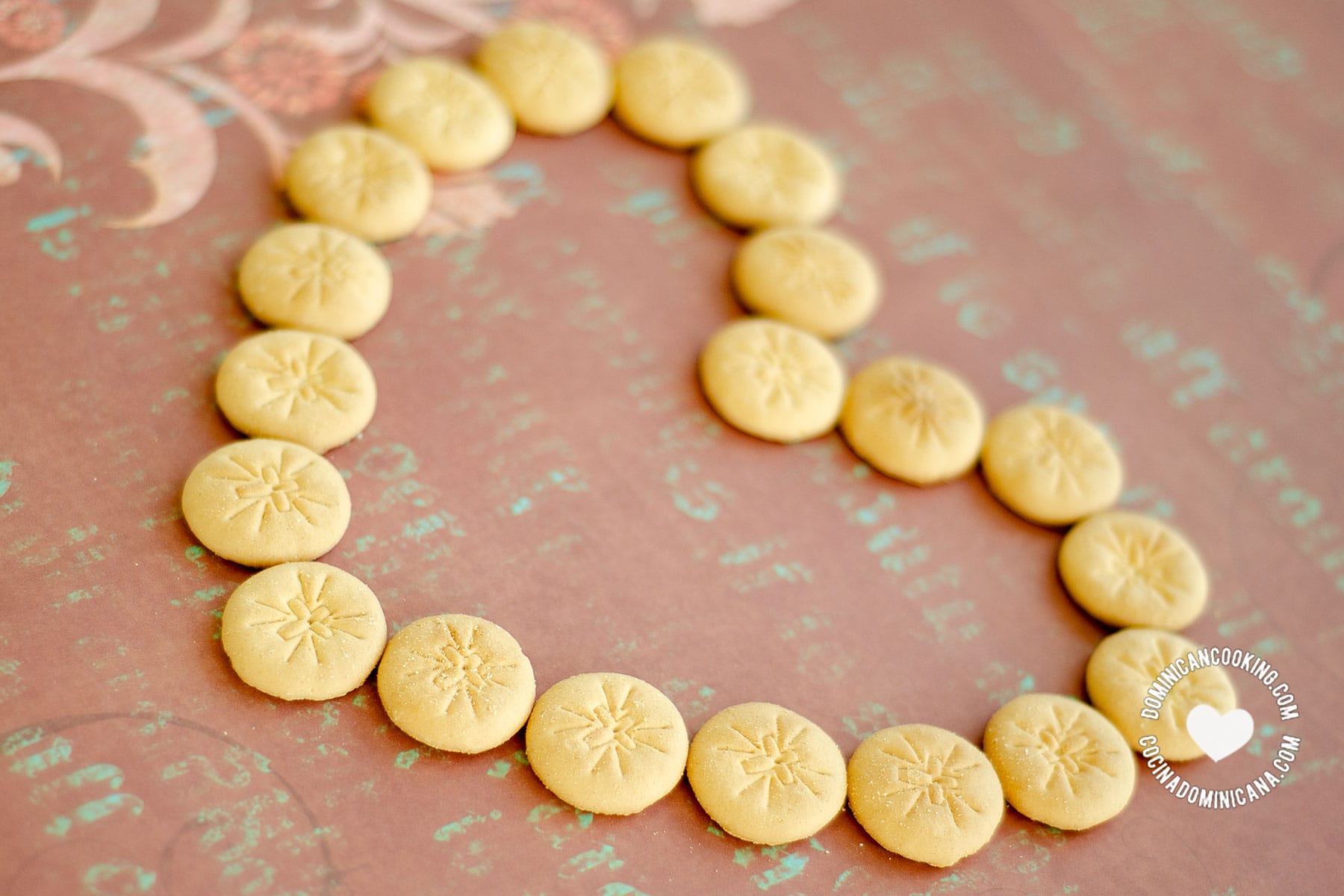 Dominican lenten cookies arranged in a heart shape.