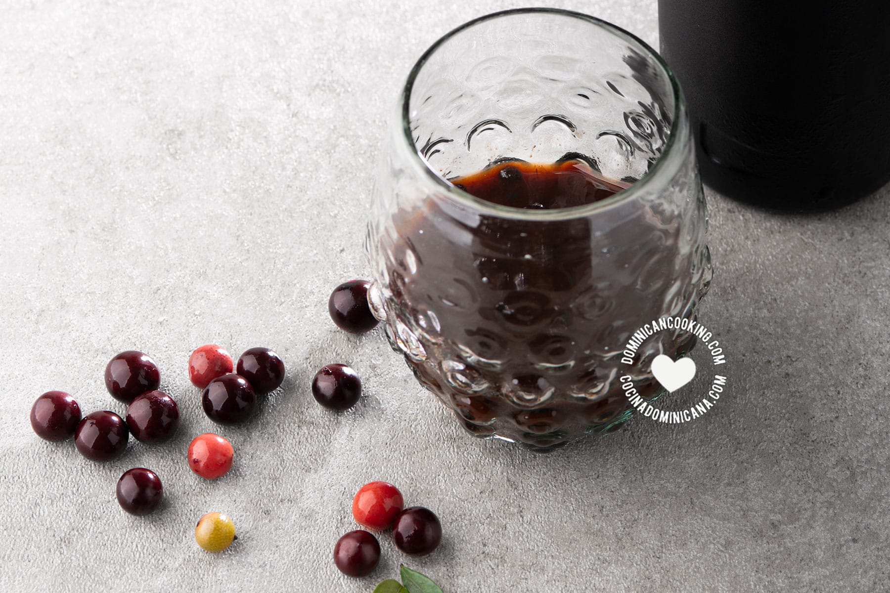 Guavaberry drink and fruits.