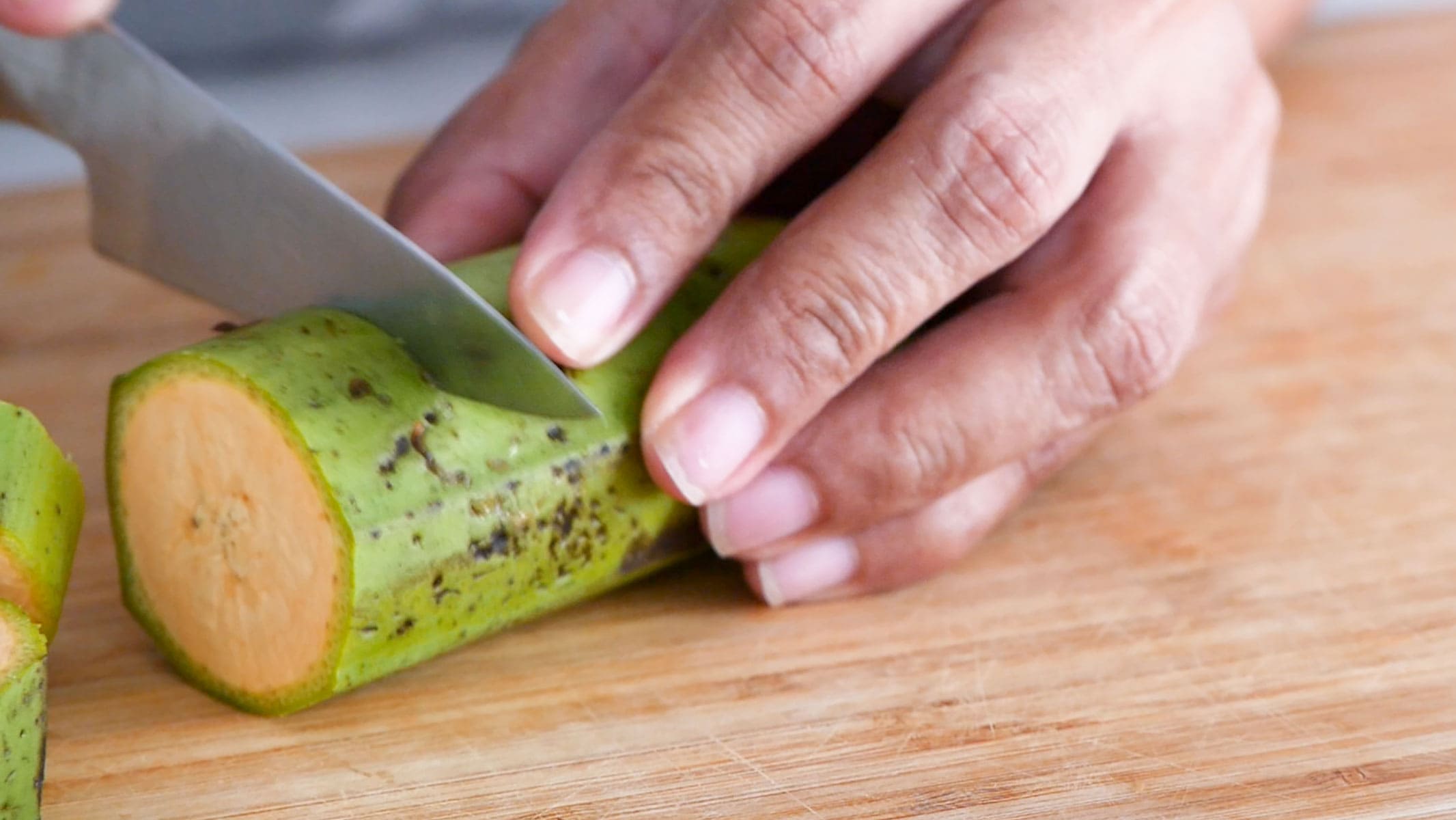 Cutting the plantains.