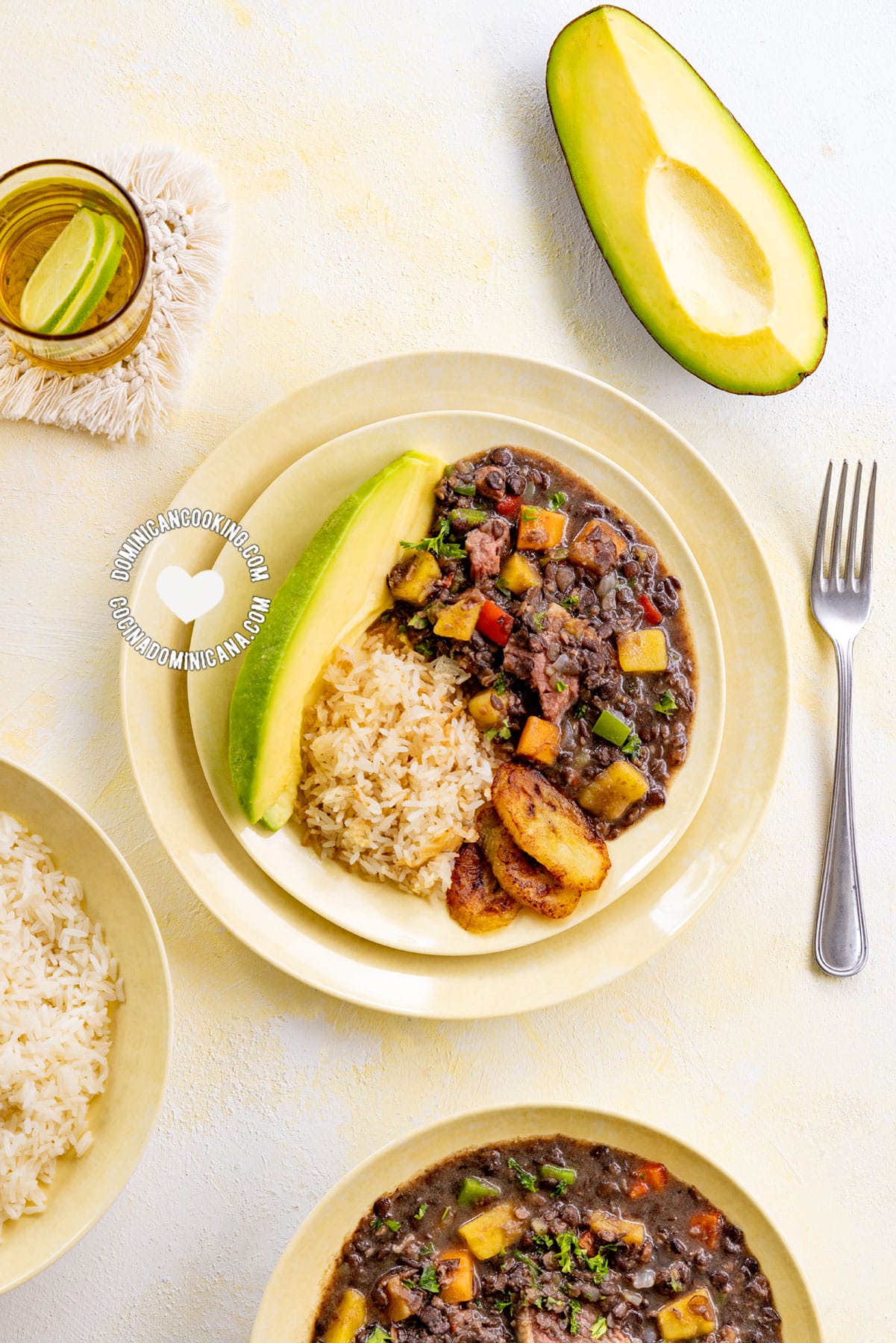 Lentejas guisadas (stewed lentils) with rice, sweet plantains and avocado.