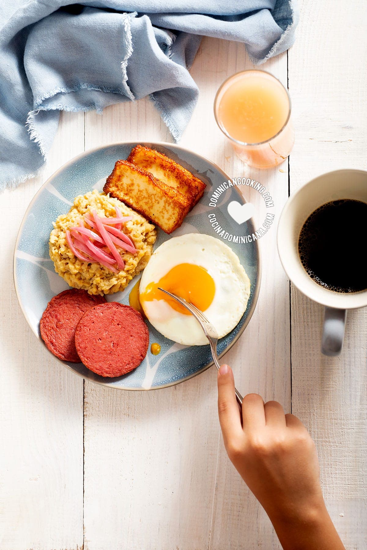 Plate of mang&uacute; with cheese, salami, and eggs