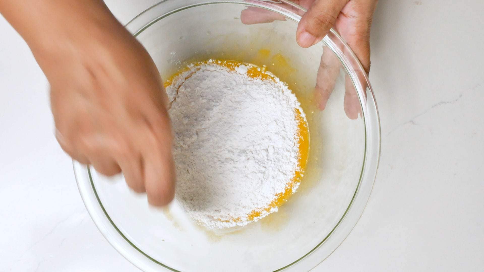Mixing flour for dough.