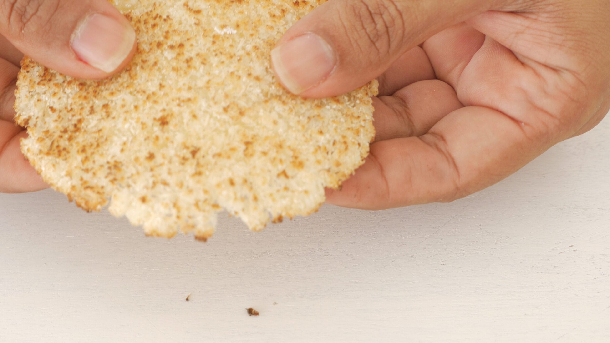 Checking that casabe isn't soft.