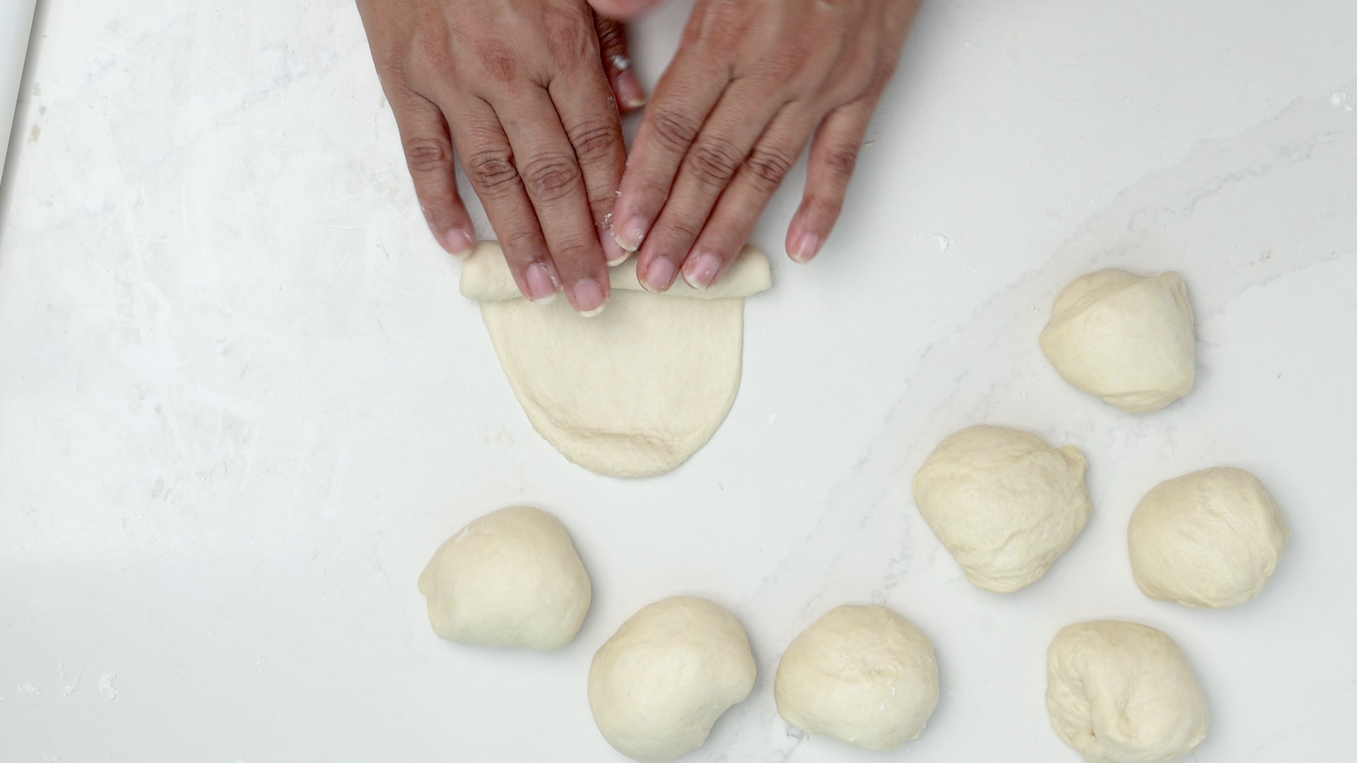 Shaping the buns.