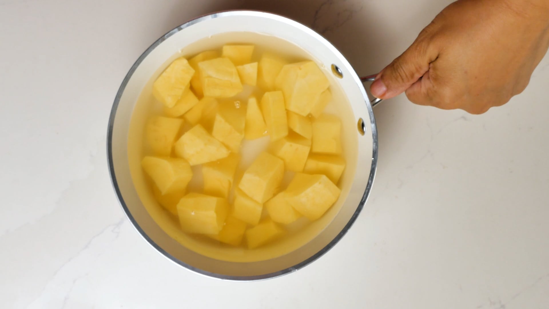 Boiling the celery root.