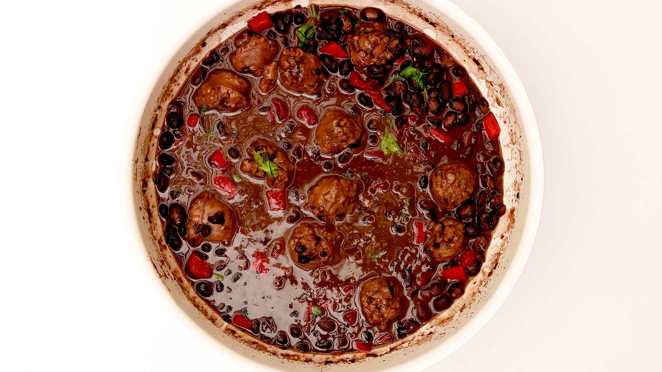 Stewing black beans.