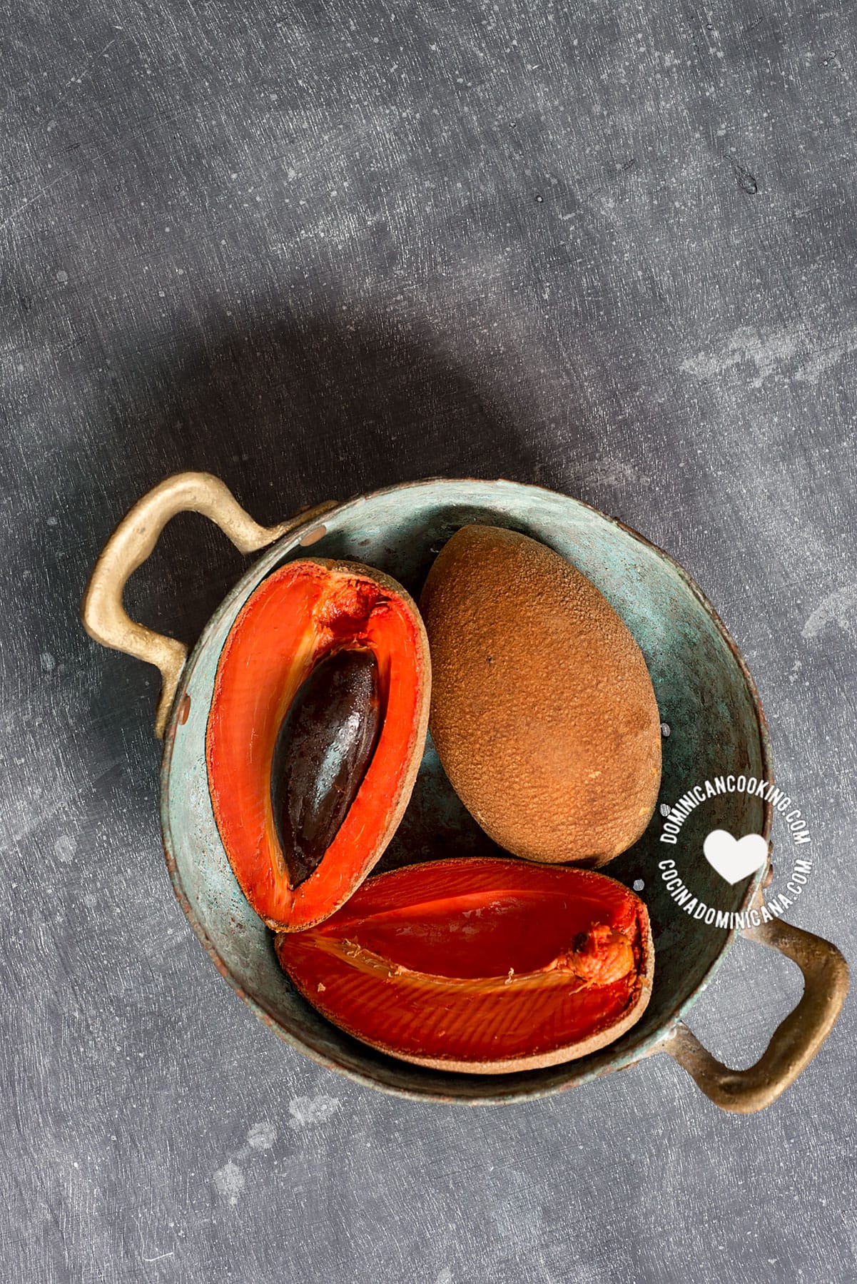 Zapote fruit in colander.